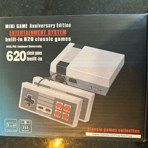 Mini Anniversary Edition Game Console with Built-in 620 Classic Games.